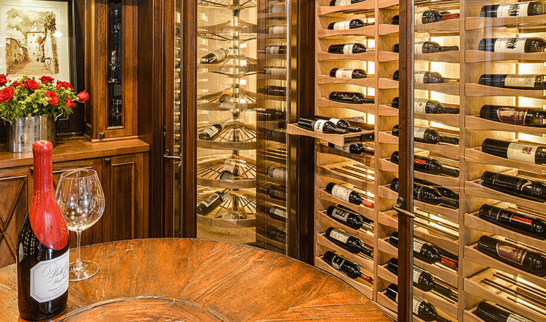 sliding pullout drawer in glass enclosed wine cellar