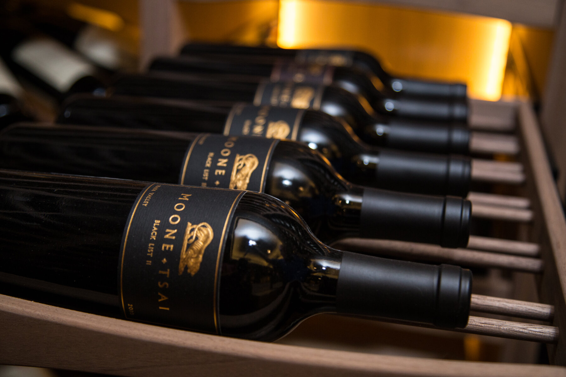 Close up of 6-bottle deep pullout wine drawers
