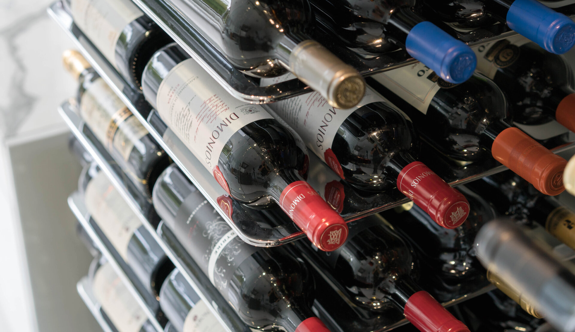 close up of modern metal rotating wine racks