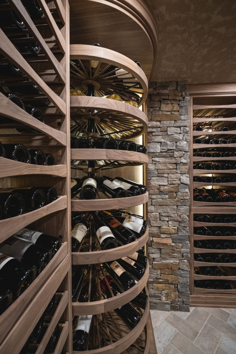 Full height wine wheel in Walnut in rustic wine cellar