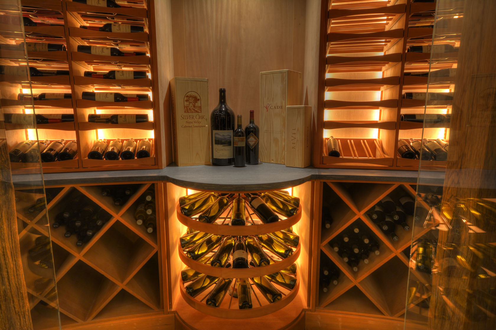 Revel Wine Wheel under-counter rotating wine rack in a Mahogany wine cellar